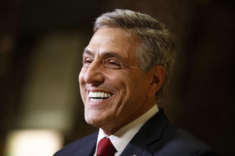 In this Nov. 29, 2016, file photo, U.S. Rep. Lou Barletta, R-Pa., smiles as he talks with reporters after a meeting with President-elect Donald Trump at Trump Tower in New York. During Pennsylvania's Tuesday, May 15, 2018, primary election, Republican Party voters in the state will select Barletta or Pennsylvania state Rep. Jim Christiana as their nominee to challenge Democratic U.S. Sen. Bob Casey's re-election bid. (AP Photo/Evan Vucci, File)