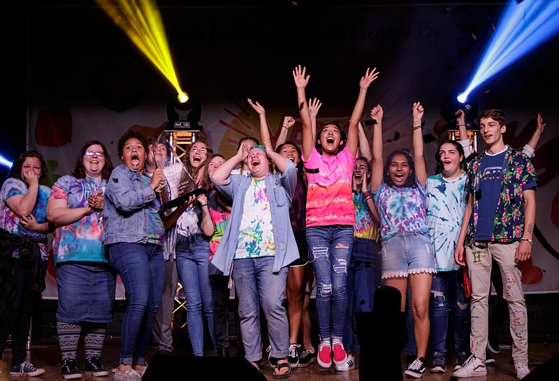 Staff photo by Doug Strickland / 
The winning Hixson High School shoe design team reacts as confetti is fired from the stage after on Thursday, May 17, 2018, in Chattanooga, Tenn. Hixson was awarded $75,000 after their Vans shoe design competition team beat more than 500 other schools to win the contest.