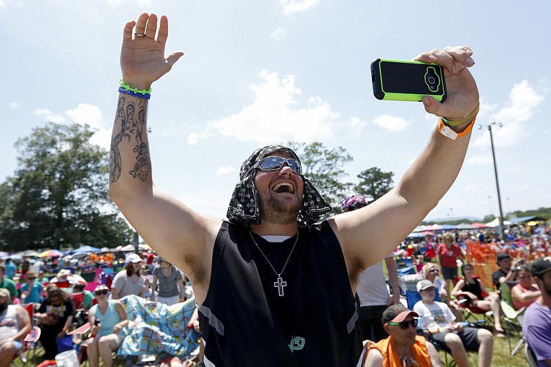 Leonel "BICLG" Gutierrez cheers for artist Gawvii at last year's Jfest at Camp Jordan Park.