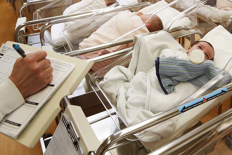 This Thursday, Feb. 16, 2017, file photo shows newborn babies in the nursery of a postpartum recovery center in upstate New York. (AP Photo/Seth Wenig)