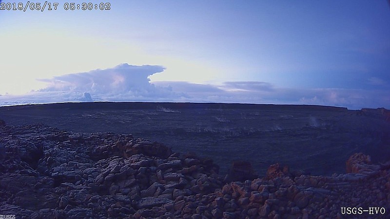 This photo provided by U.S. Geological Survey shows the ash plume at the Klauea Volcano, taken from a Mauna Loa webcam on Thursday, May 17, 2018 in Hawaii. 