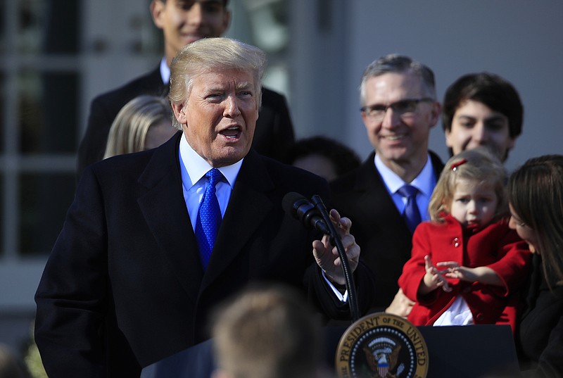 In this Jan. 19, 2018 file photo, President Donald Trump speaks to participants of the annual March for Life event, in the Rose Garden of the White House in Washington. The Trump administration will resurrect a Reagan-era rule that would ban federally-funded family planning clinics from discussing abortion with women, or sharing space with abortion providers, a senior White House official said Thursday, May 17, 2018. The Department of Health and Human Services will be announcing its proposal Friday, the official said on condition of anonymity because the official was not authorized to confirm the plans before the announcement. (AP Photo/Manuel Balce Ceneta, File)