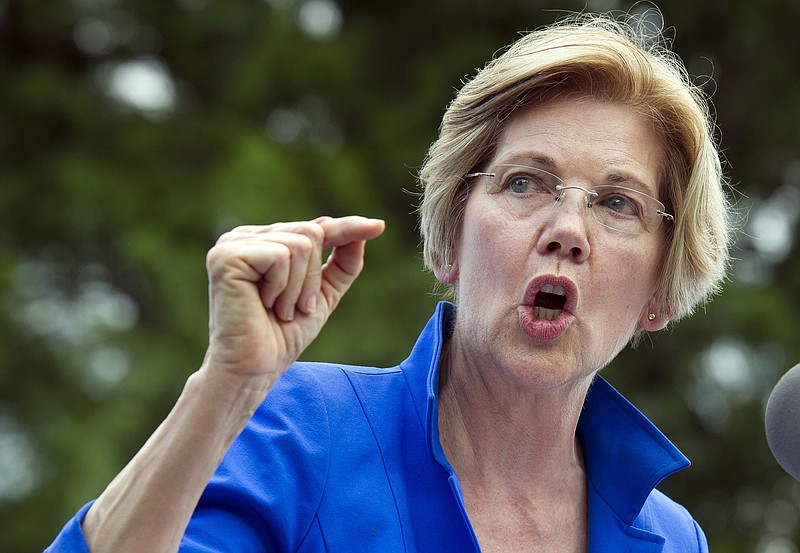 A native of India will be able to keep a photo of faux American Indian Sen. Elizabeth Warren, D-Mass., outfitted in a headdress on the side of his campaign bus.