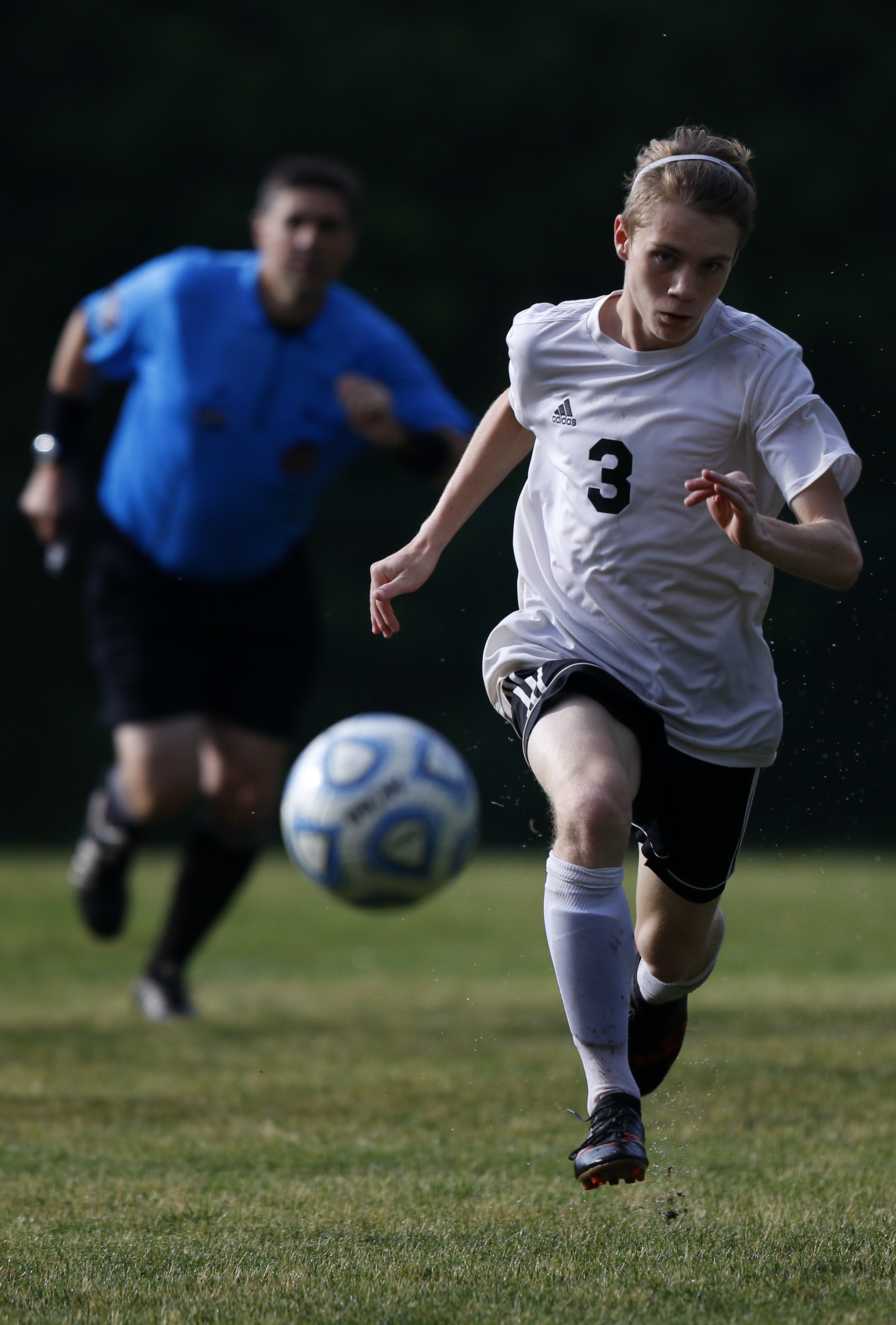 Signal Mountain's Aaron Easterly runs down a ball against RePublic at Signal Mountain Middle/High School on Sunday, May 20, 2018 in Signal Mountain, Tenn.