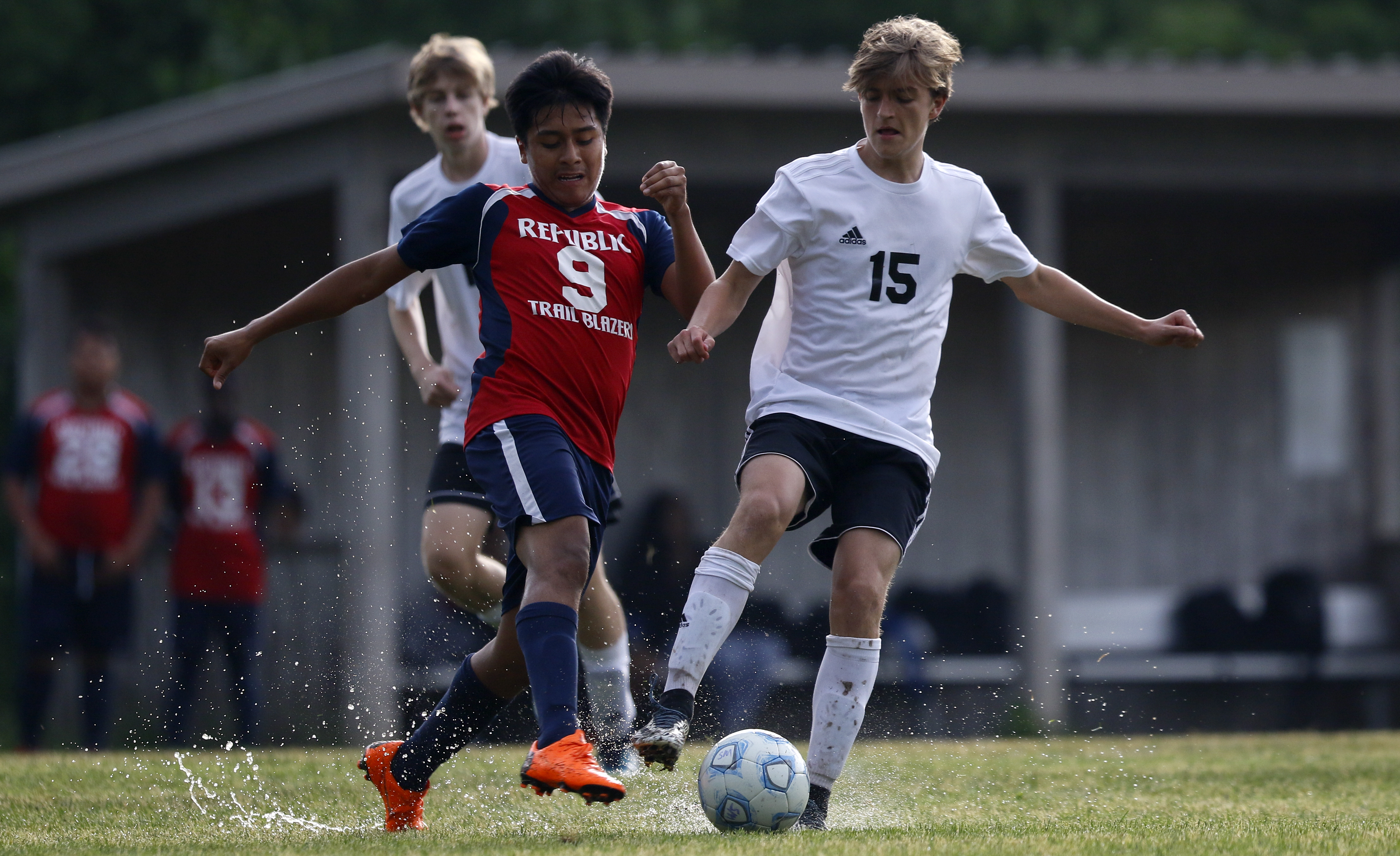 Signal Mountain's Max Burk (15) plays the ball against RePublic's Oscar Rosales (9) at Signal Mountain Middle/High School on Sunday, May 20, 2018 in Signal Mountain, Tenn.