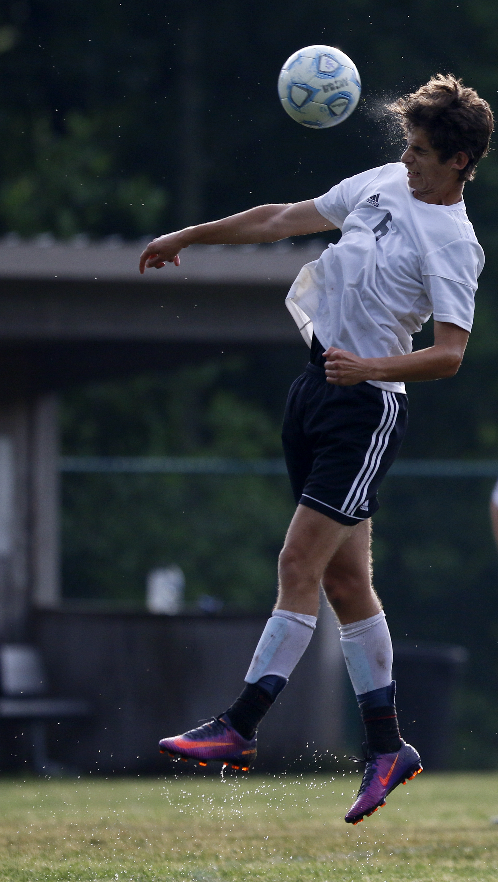 Signal Mountain's Cadyn Huddleston heads the ball during a TSSAA Class A state sectional against RePublic on Sunday afternoon. Huddleston had a goal as the host Eagles won 6-0.