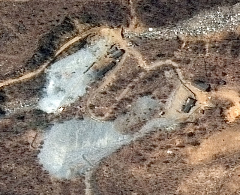 
              This April 20, 2018, satellite image provided by DigitalGlobe shows the nuclear test site in Punggye-ri, North Korea. Foreign journalists will journey into the mountains of North Korea this week to observe the closing of the country’s nuclear test site, a display of goodwill ahead of leader Kim Jong Un’s planned summit with President Donald Trump.  Satellite Image ©2018 DigitalGlobe, a Maxar company via AP)
            