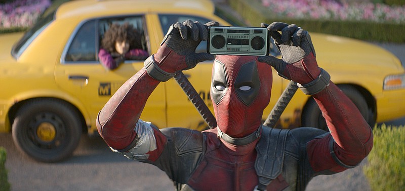 This image released by Twentieth Century Fox shows Ryan Reynolds in a scene from "Deadpool 2." Fox's "Deadpool 2" brought in $125 million according to studio estimates Sunday, May 20, 2018, and ended the three-week reign of Disney's "Avengers: Infinity War" at the top of the North American box office. (Twentieth Century Fox via AP, File)