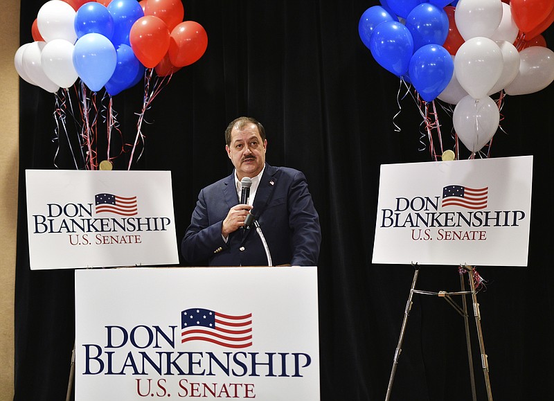 In this May 8, 2018, file photo, former Massey Energy CEO Don Blankenship speaks to supporters in Charleston, W.Va. Despite having lost the Republican primary, convicted ex-coal baron Blankenship said he's going to continue his bid for U.S. Senate as a third-party candidate. Blankenship's campaign said in a news release Monday, May 21, that he'll be running as a member of the Constitution Party, which nominated him by a unanimous vote. (AP Photo/Tyler Evert, File)