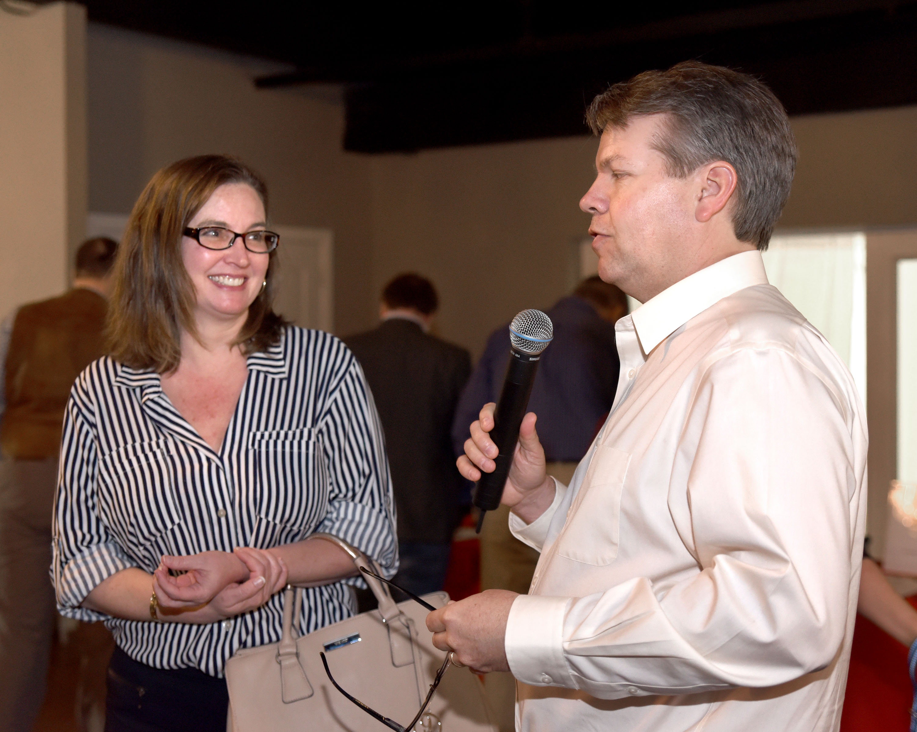 Jenny Mulqueeney and emcee David Karnes