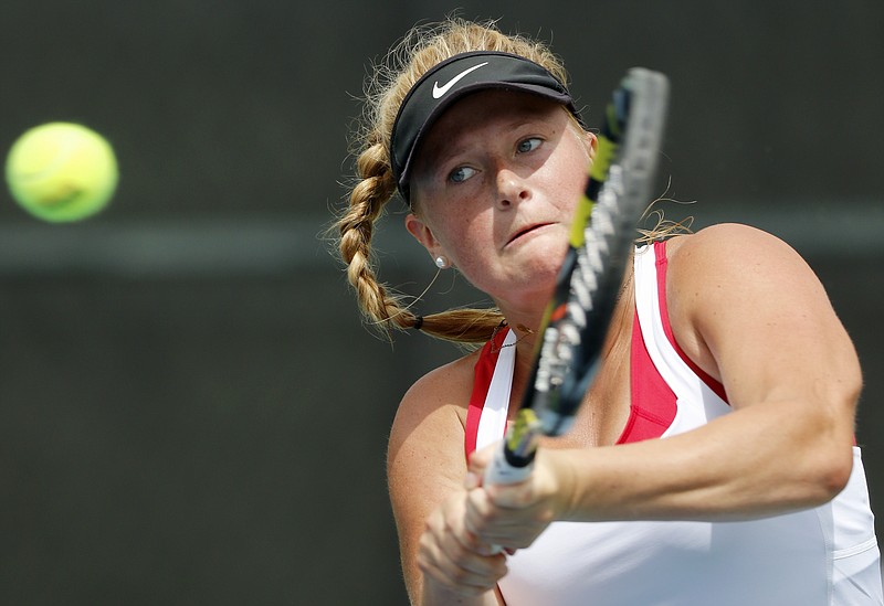 Baylor's Presley Thomas hits a backhand against Harpeth Hall during her No. 1 singles in the Division II Class AA semifinals during Spring Fling XXV at the Adams Tennis Complex on Tuesday, May 22, 2018 in Murfreesboro, Tenn.