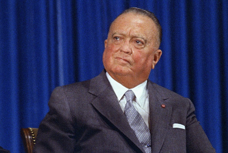 FILE - In this July 1, 1971, file photo, FBI Director J. Edgar Hoover, is shown at the graduation ceremonies for the Federal Bureau of Investigation in Washington.   Government informants are an age-old investigative tactic that’s as much a part of the FBI’s 110 years of history as J. Edgar Hoover or its “10 Most Wanted” list.   (AP Photo/Harvey Georges)