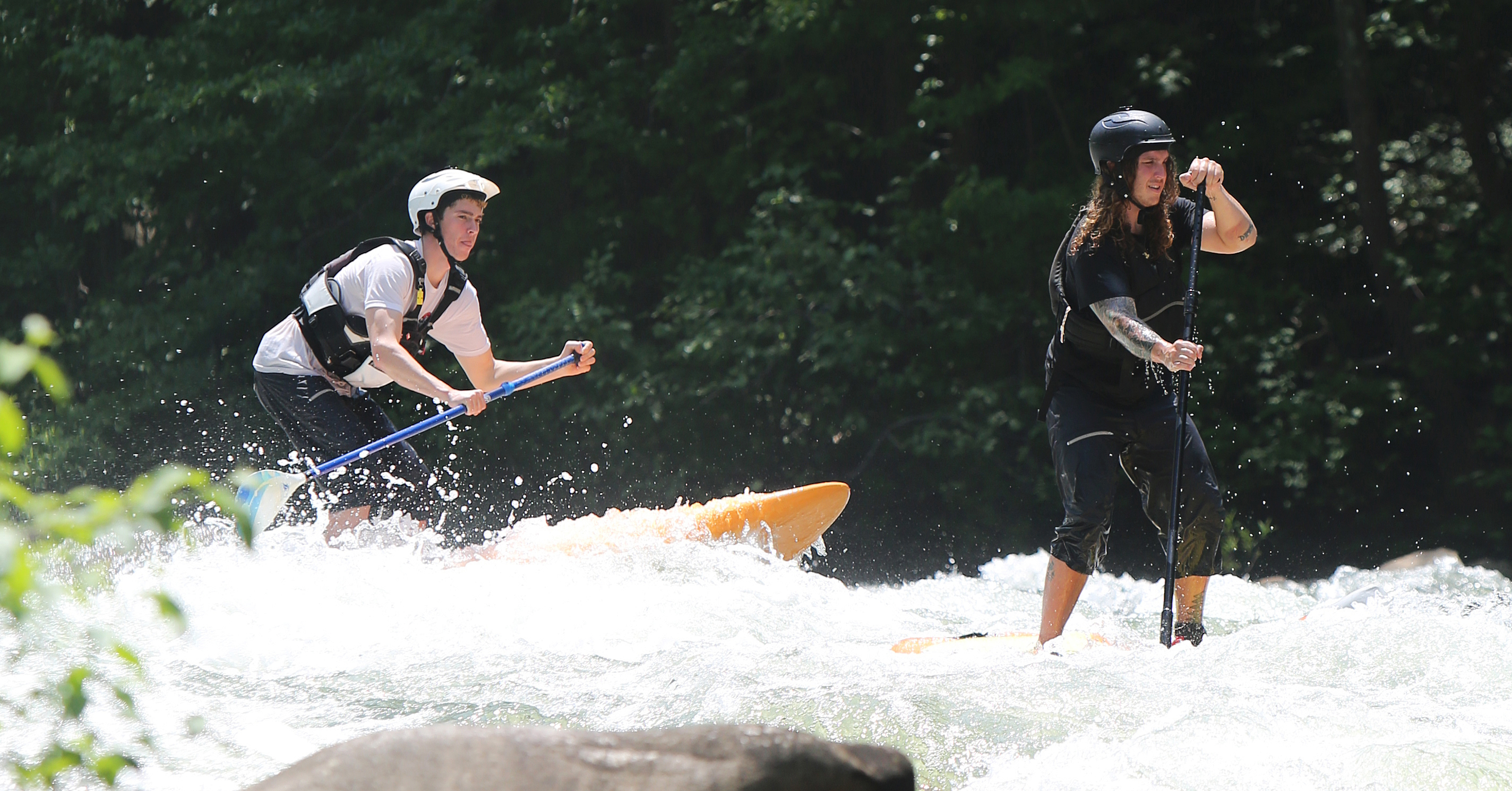 Chris Storgion, 24, and Alex Storgion, 26, make their way through rapids on the Ocoee River.