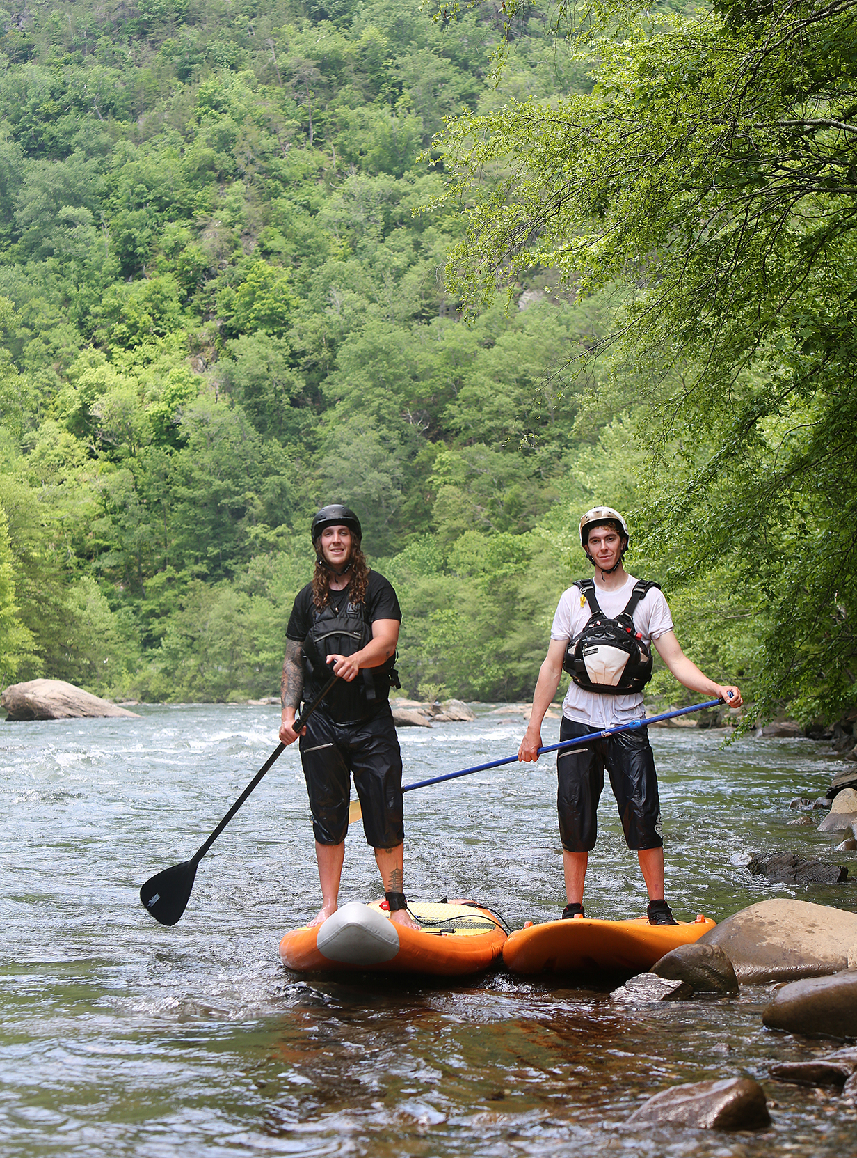 Alex and Chris Storgion, from left, have claimed a number of first descents on their whitewater paddleboards. xxx