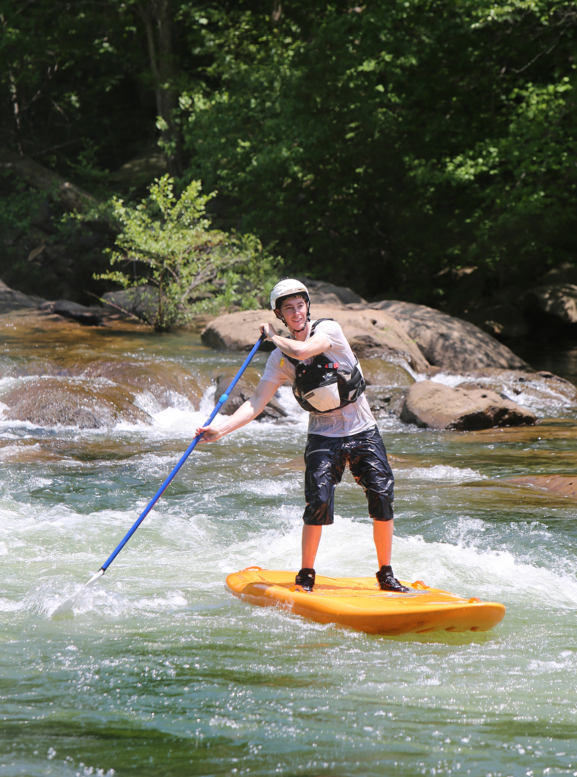 Chris Storgion, 24, makes his way through rapids on his standup paddle board on the Ocoee River in Benton, Tenn., Monday, May 14, 2018.
