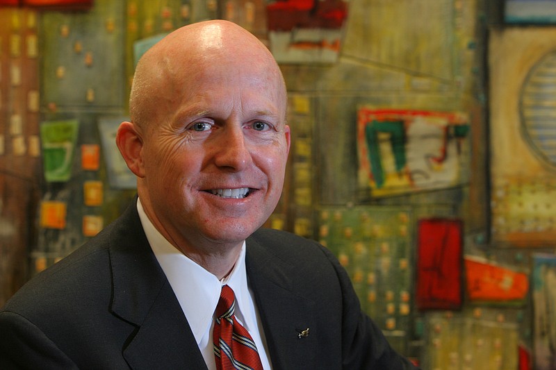 Craig Holley, Chairman, President, and CEO of CapitalMark Bank & Trust, sits in his office Wednesday morning. CapitalMark has surpassed growth targets in its six months of operation.