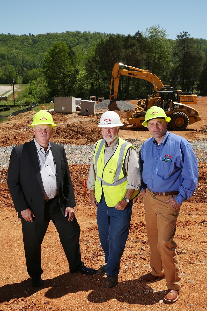 President of P&C Construction Royce Cornelison, Project Superintendent Bill Webb and Executive Vice President of P&C Construction Nic Cornelison pose for a photo Monday, April 30, 2018 at the construction site of the new It Is Written Ministry Headquarters in Collegedale, Tenn. P&C Construction, which is a construction company based out of Chattanooga, is celebrating its 25th year in business.