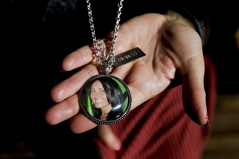 Kimberlin Nickles displays a locket with a photograph of her daughter, Chasity Glisson, in Fort Lauderdale, Fla., on Dec.19, 2017. Glisson left her Lexus running in the garage and was killed after carbon monoxide filled her home. (Scott McIntyre/The New York Times)