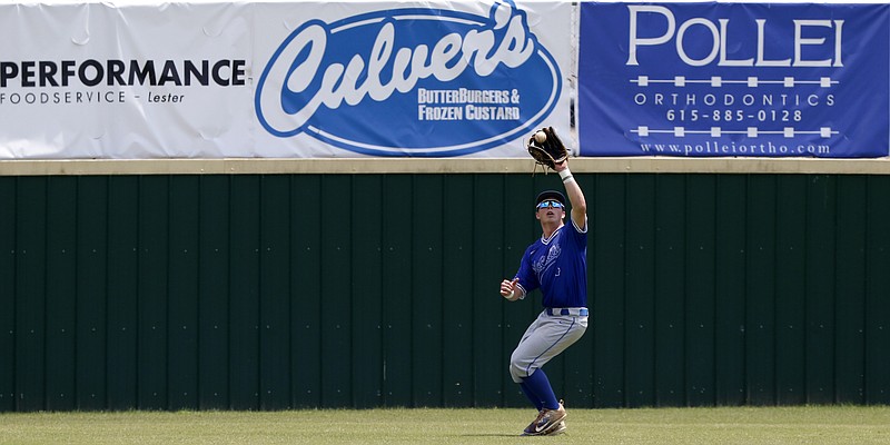 McCallie's Chad Marsh III makes a catch in the out field during the Division II Class AA winner's bracket final against Baylor at Wilson Central High School during Spring Fling XXV on Wednesday, May 23, 2018 in Lebanon, Tenn.