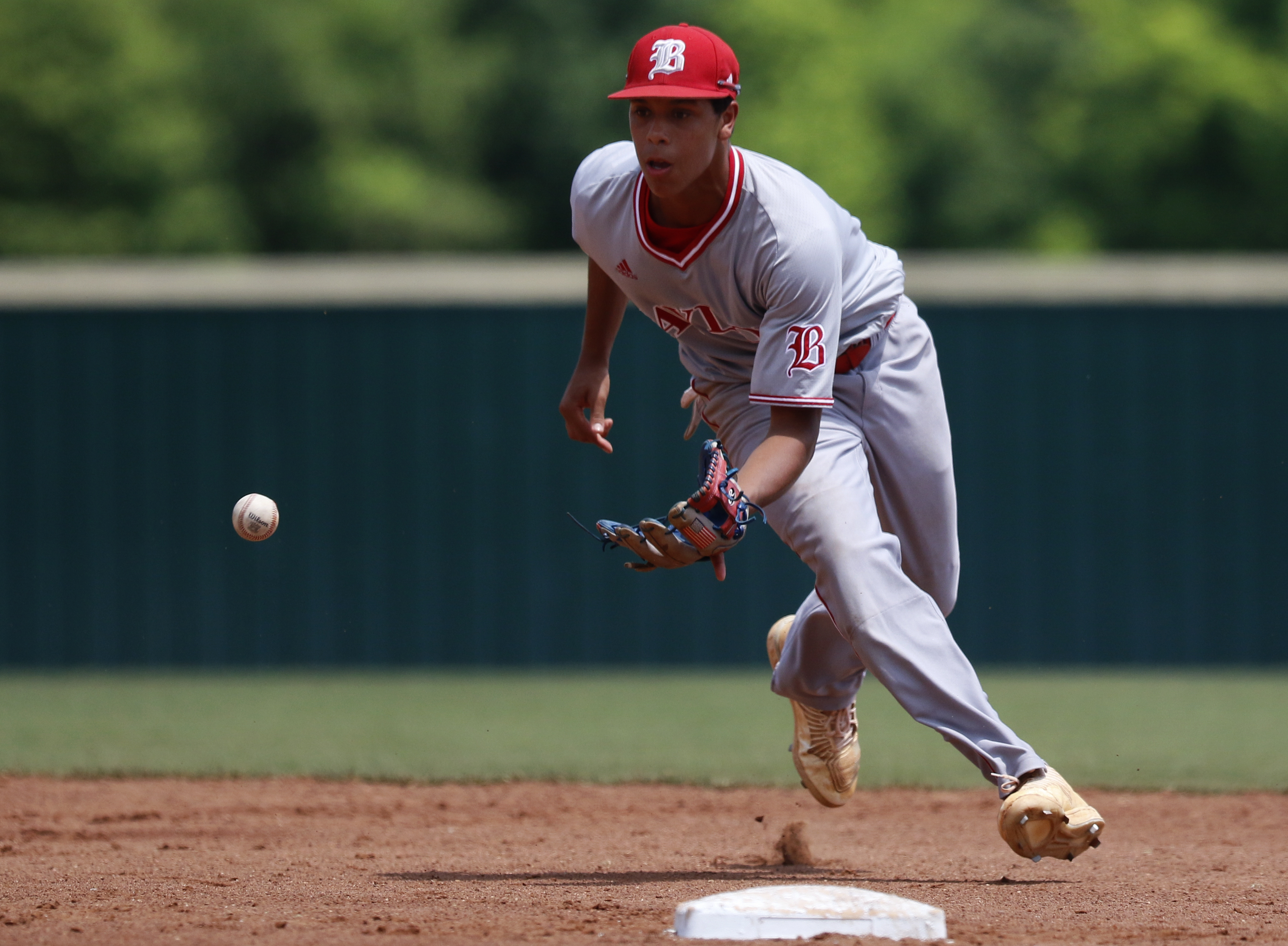 Baylor's Daniel Corona fields the ball against McCallie during the Division II Class AA winner's bracket final at Wilson Central High School during Spring Fling XXV on Wednesday, May 23, 2018 in Lebanon, Tenn.