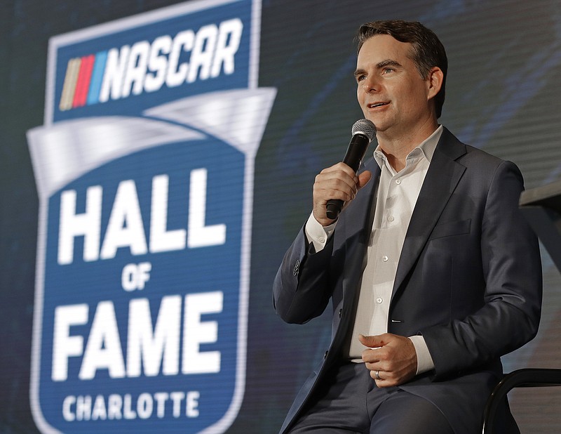 Jeff Gordon speaks to the media after being named to the 2019 class of the NASCAR Hall of Fame, in Charlotte, N.C., Wednesday, May 23, 2018. (AP Photo/Chuck Burton)