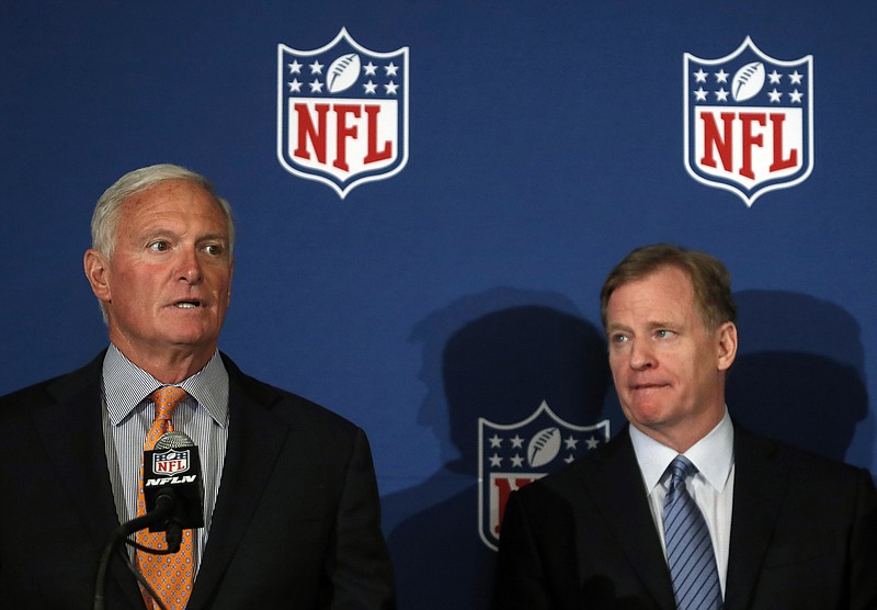 Cleveland Browns owner Jimmy Haslam speaks as NFL commissioner Roger Goodell looks on at right after they announced NFL team owners have reached agreement on a new league policy that requires players to stand for the national anthem or remain in the locker room, during the NFL owner's spring meeting Wednesday, May 23, 2018, in Atlanta. (AP Photo/John Bazemore)