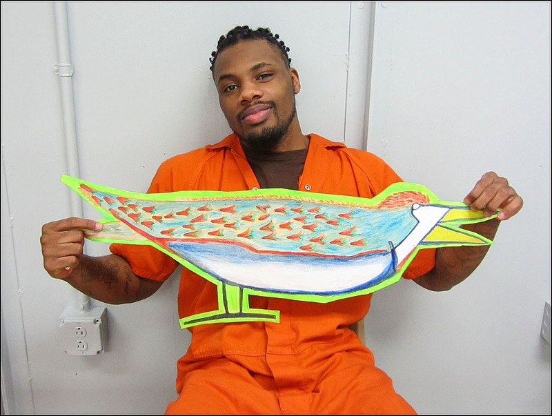 Inmates who worked on the "Birds of Freedom" mural first completed simple avian drawings. (Photo from Mark Making)