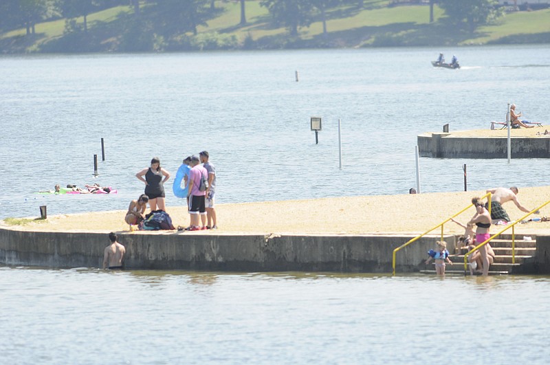 Beach-goers enjoy the water Thursday at Chester Frost Park.