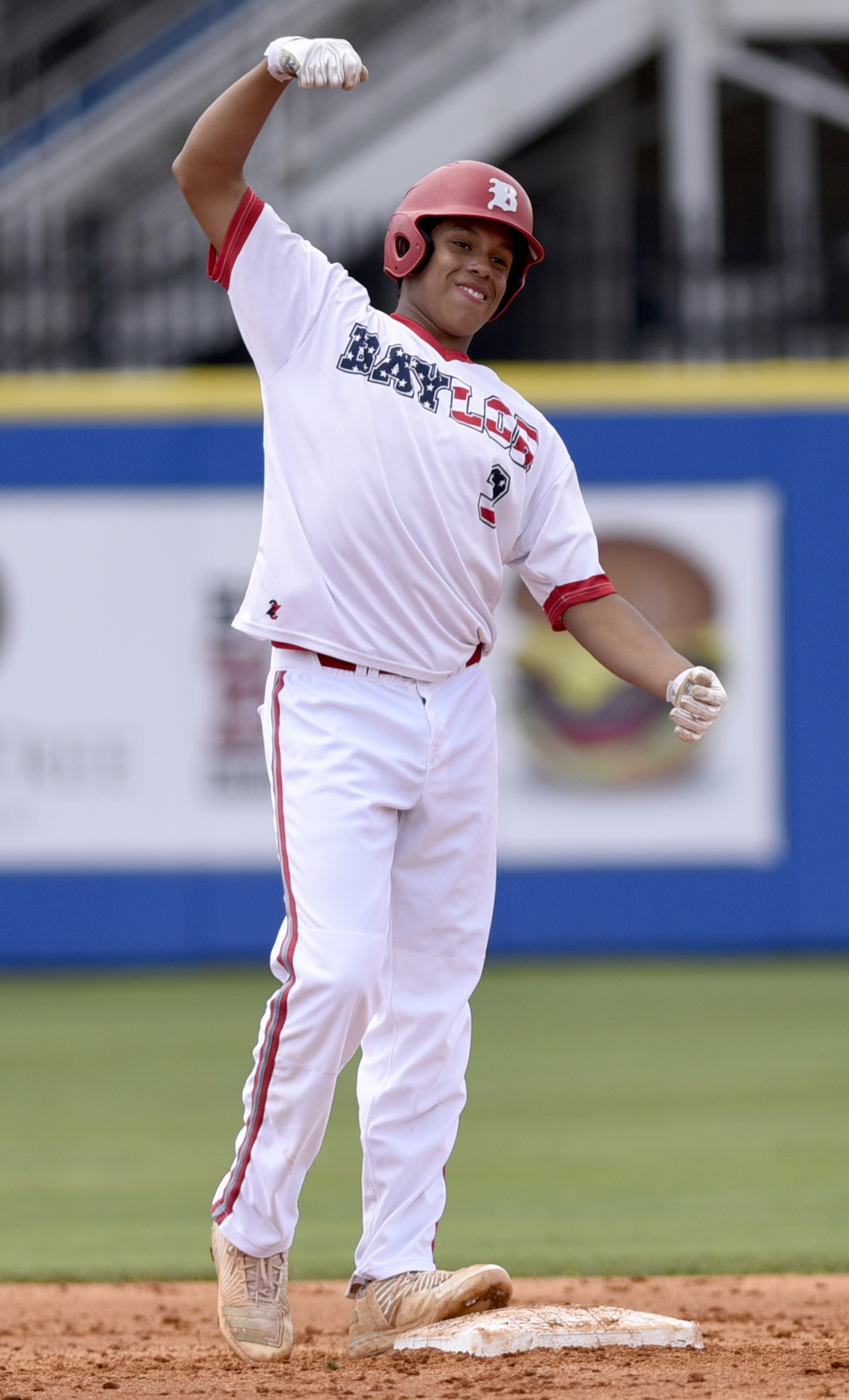 Baylor's Daniel Corona (3) celebrates is double standing on second base. during the Division II-AA baseball championship against Memphis University School in TSSAA Spring Fling action in Murfreesboro, Tenn. on May 24, 2018.