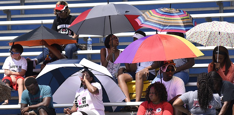 iUmbrellas provide the shade at Dean Hayes Track and Field Stadium on the campus of Middle Tennessee State Univeristy during the TSSAA Spring Fling action in Murfreesboro, Tenn. on May 24, 2018.