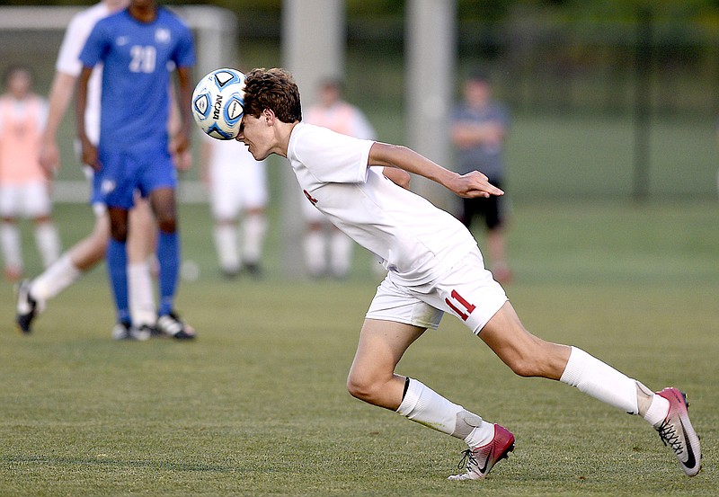 Baylor's Carter Smith (11) makes a low header in TSSAA Spring Fling action in Murfreesboro, Tenn. on May 24, 2018.