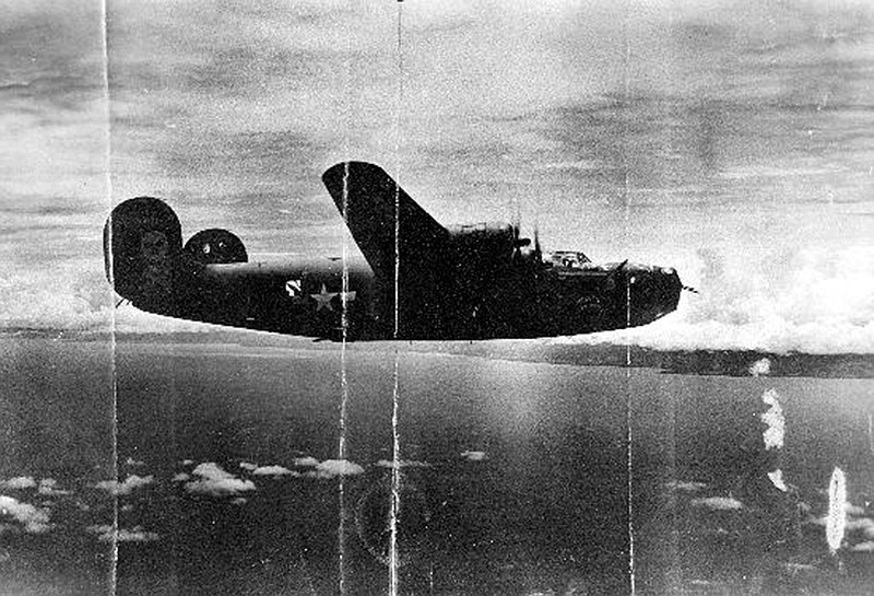 
              This circa 1943 U.S. Army Air Force photo from the Kelly Family Research Project shows the "Heaven Can Wait" B-24 bomber, location unknown, in which Lt. Thomas Kelly died when it was shot down in Hansa Bay in what is now Papua New Guinea during World War II. When Tom Kelly's relatives got word that his bomber had been found, a wave of exhilaration mixed with grief washed over family members. Although relatives who never met Kelly had pieced much of his life story together over the years, they never knew what happened when his plane was shot down off the coast of Papua New Guinea in 1944. They got their answer recently when the group Project Recover found the B-24 bomber under 213 feet of water. (U.S. Army Air Force/Kelly Family Research Project via AP)
            