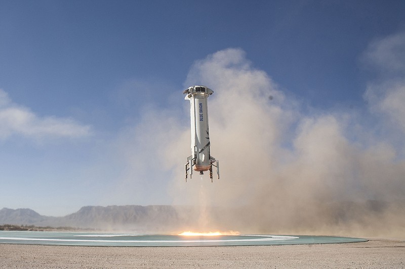 
              FILE - In this Tuesday, Dec. 12, 2017 photo provided by Blue Origin, the New Shepard booster lands in west Texas during a test. On Thursday, May 24, 2018, President Donald Trump signed a space policy directive asking the government to make it easier for private companies to get to and from space. (Blue Origin via AP)
            