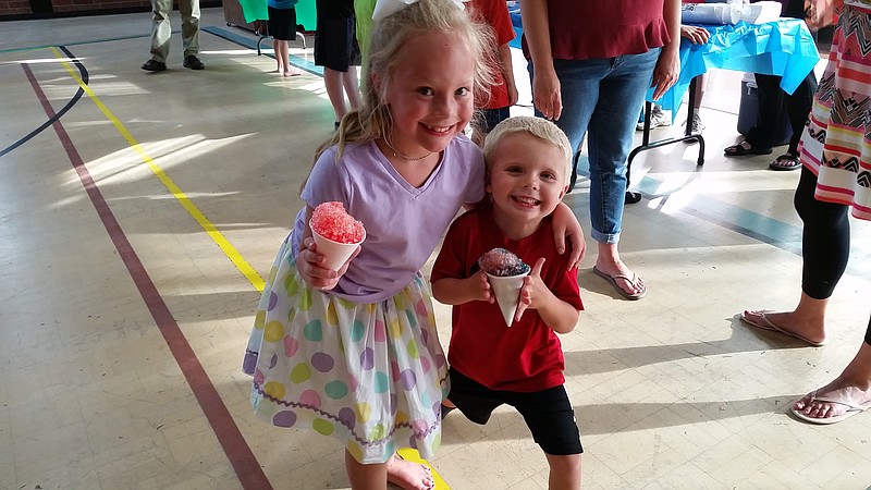 Allison Horsman and Griffin Tonkin enjoy sno cones at the 2017 registration night for Awana, the weekly children's program at Signal Mountain Baptist Church. The church will also be serving sno cones at its first Community Carnival, scheduled for Sunday, June 3. (Contributed photo)