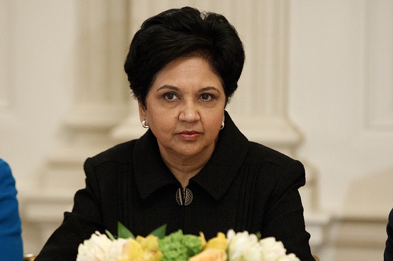 FILE- In this Feb. 3, 2017, file photo, PepsiCo CEO Indra Nooyi listens during a meeting between President Donald Trump and business leaders in the State Dining Room of the White House in Washington. Topping the list of highest-paid female CEOs on the list is Nooyi, whose compensation was valued at $25.9 million. (AP Photo/Evan Vucci, File)