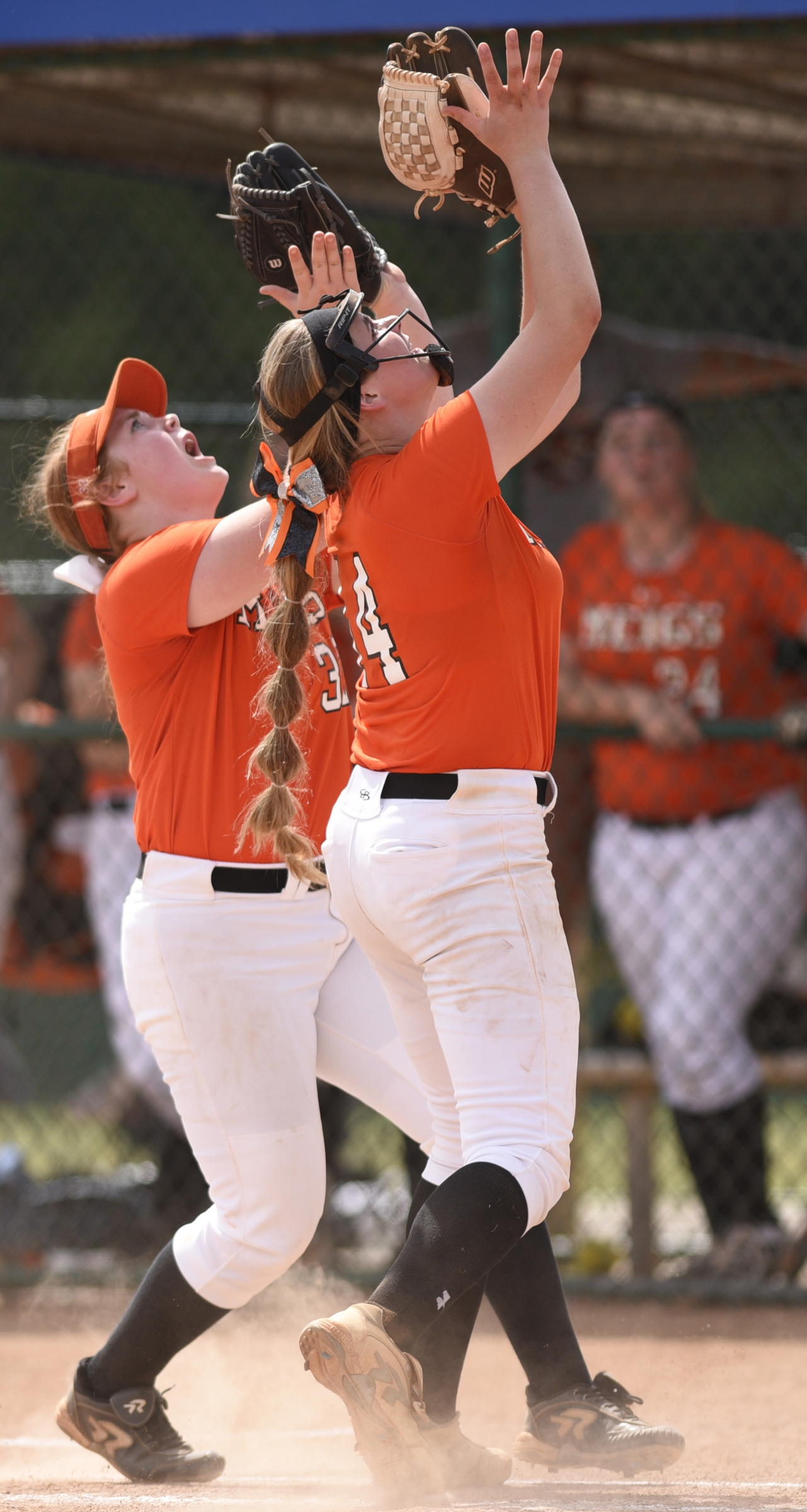 Meigs County's Ashley Rogers (14) and Summer Skinner (32) almost collide going after a pop up. White House Heritage forces a second game by defeating Meigs 3 to 1. Meigs County faced White House Heritage in the final of the TSSAA Class AA softball championship at the Starplex in Murfreesboro, Tenn. on May 25, 2018.