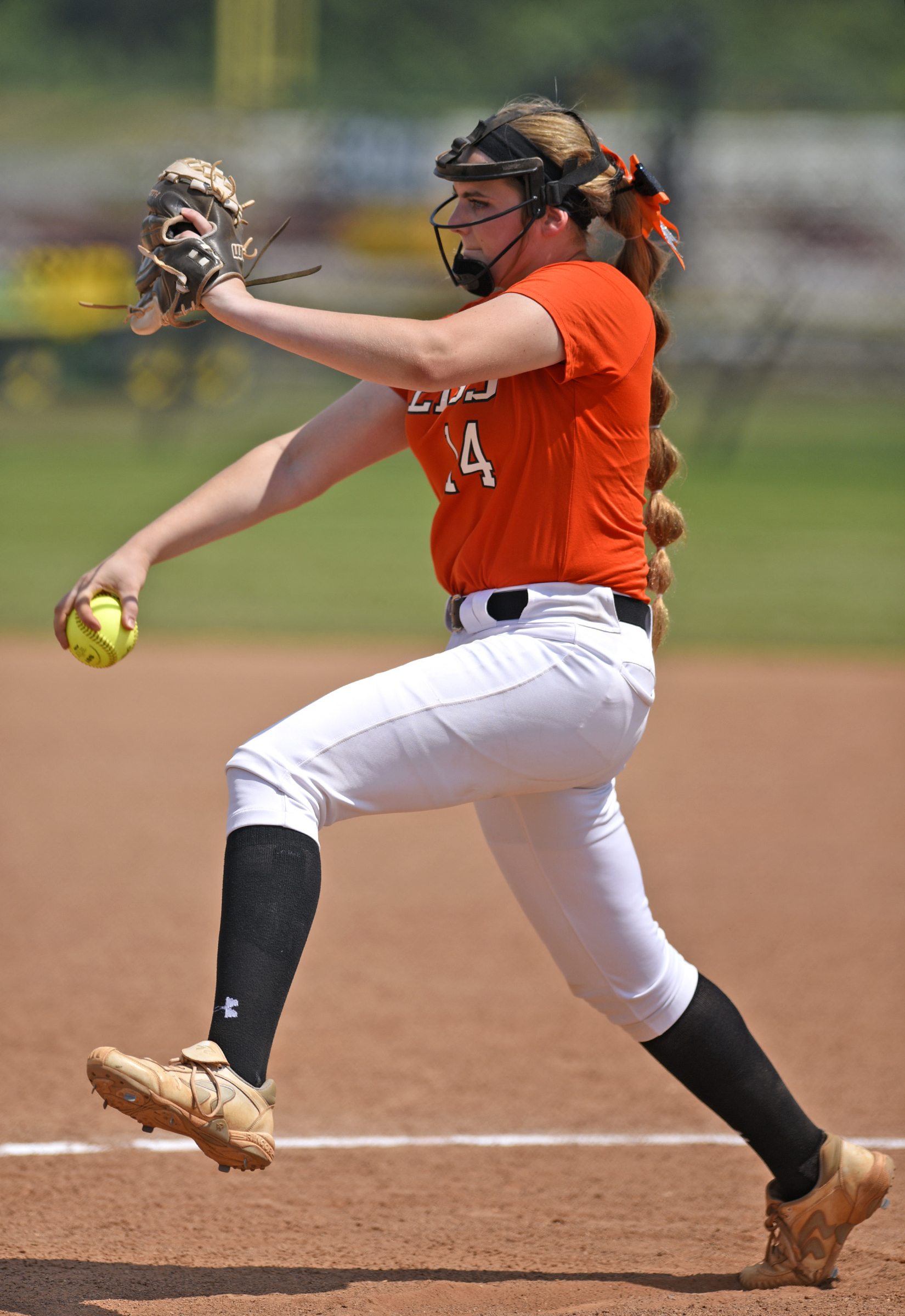 Meigs County pitcher, Ashley Rogers (14) winds up to pitch. White House Heritage forces a second game by defeating Meigs 3 to 1. Meigs County faced White House Heritage in the final of the TSSAA Class AA softball championship at the Starplex in Murfreesboro, Tenn. on May 25, 2018.