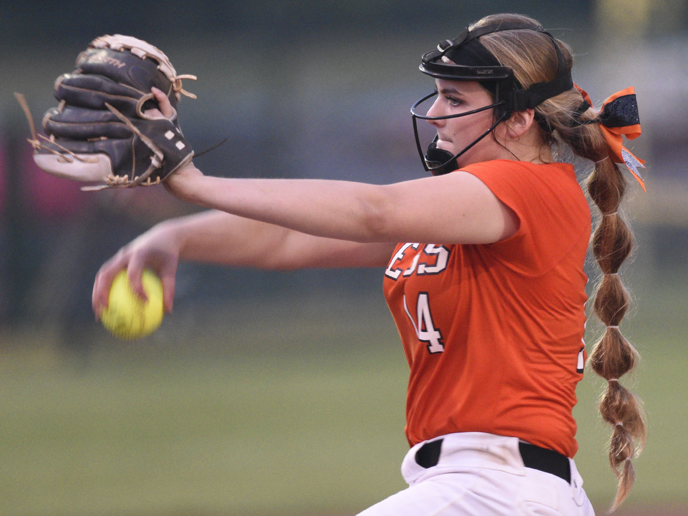 Meigs County's Ashley Rogers (14) winds up to pitch in the final game of the TSSAA Class AA softball championship at the Starplex in Murfreesboro, Tenn. on May 25, 2018.