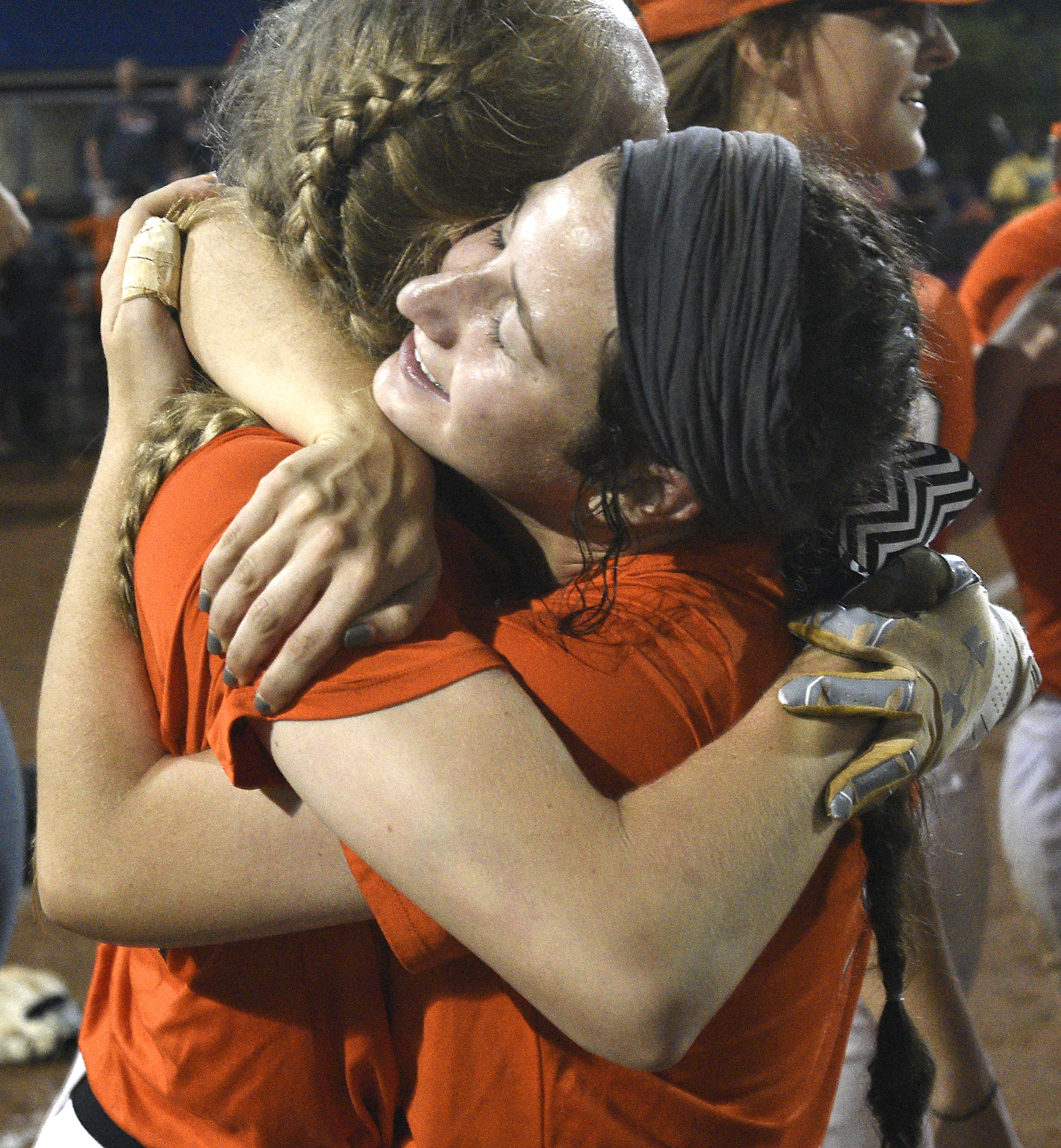 Meigs County's Taylor Odum, right, embraces another player after the Lady Tigers defeated White House Heritage 3 to 1 in the final game of the TSSAA Class AA softball championship at the Starplex in Murfreesboro, Tenn. on May 25, 2018.