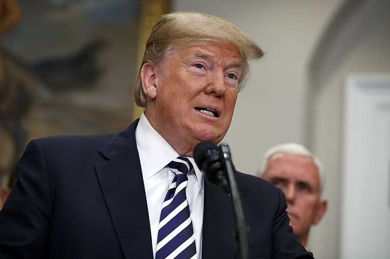 President Donald Trump speaks on North Korea before signing the "Economic Growth, Regulatory Relief, and Consumer Protection Act," in the Roosevelt Room of the White House, Thursday, May 24, 2018, in Washington (AP Photo/Evan Vucci)