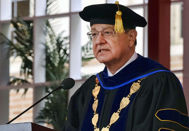 In this May 12, 2017 photo University of Southern California, USC President C.L. Max Nikias presides at commencement ceremonies on the campus in Los Angeles.