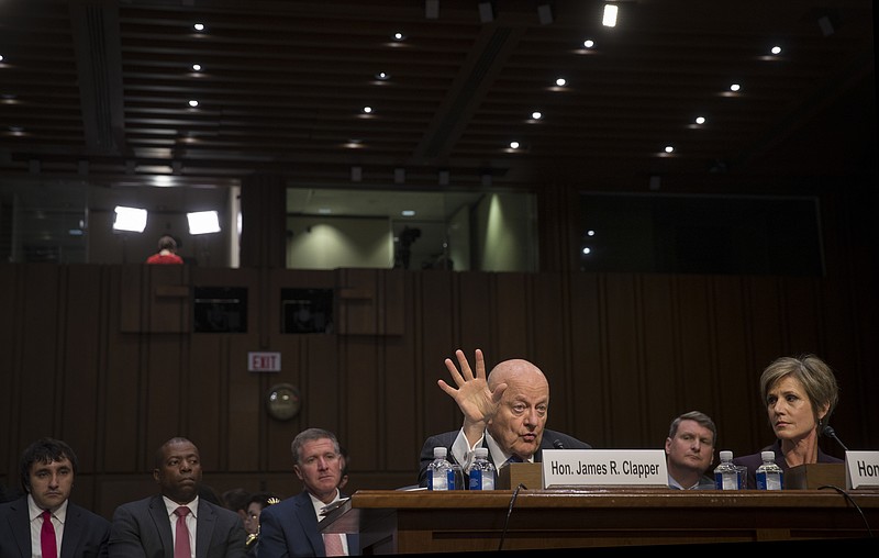 FILE — James Clapper, the former director of national intelligence, and Sally Yates, the former acting attorney general, testify before a Senate Judiciary subcommittee hearing on Russia's alleged interference in 2016's presidential election, on Capitol Hill in Washington, May 8, 2017. (Stephen Crowley/The New York Times)