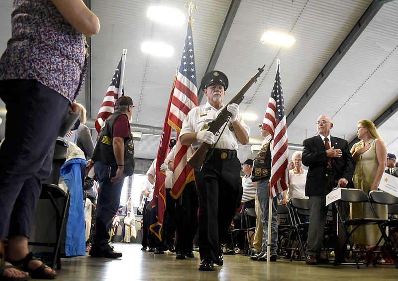 Members of the Vietnam Veterans of America, Chapter 203, Color Guard present the Colors.  Because of inclement weather this year's Memorial Day Program, sponsored by the Chattanooga Chapter of the Military Officers Association of America, was moved to the shelter of the National Guard Armory on Holtzclaw Avenue on May 28, 2018.  