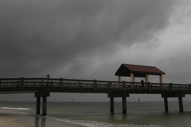 Rain falls on Clearwater Beach by Pier 60 early Sunday morning May 27, 2018, as northbound Subtropical Storm Alberto looms in the gulf to the southwest. (Jim Damaske/Tampa Bay Times via AP)