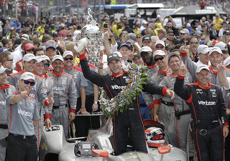 Will Power, of Australia, celebrates after winning the Indianapolis 500 auto race at Indianapolis Motor Speedway, in Indianapolis Sunday, May 27, 2018. (AP Photo/Darron Cummings)