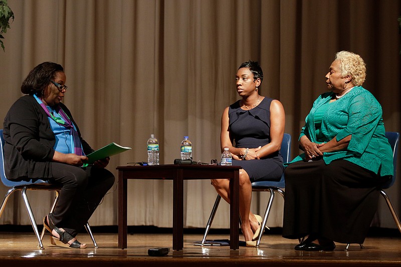 Moderator Edna Varner, left, asks questions of incumbent Karitsa Mosley Jones, center, and challenger Ann Pierre during the Hamilton County Board of Education District 5 candidates' debate at Dalewood Middle School on Tuesday, May 29, 2018, in Chattanooga, Tenn. This was the final debate between school board candidates hosted by the UnifiEd and Chattanooga 2.0 organizations.