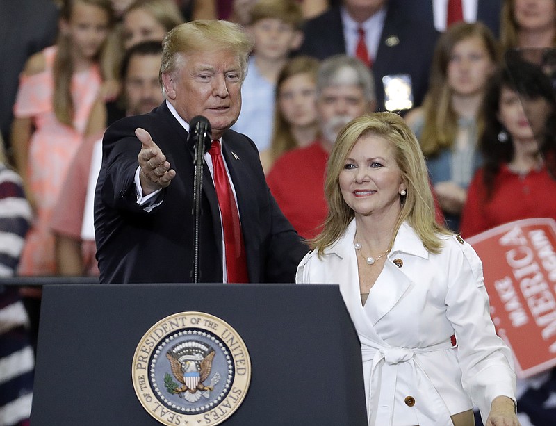 President Donald Trump introduces Rep. Marsha Blackburn, R-Tenn., at a rally Tuesday, May 29, 2018, in Nashville, Tenn. (AP Photo/Mark Humphrey)