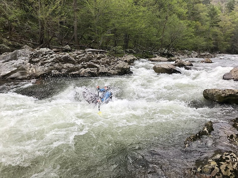 Sunny Montgomery paddles the steep, boulder-strewn Big Laurel Creek in Western North Carolina.