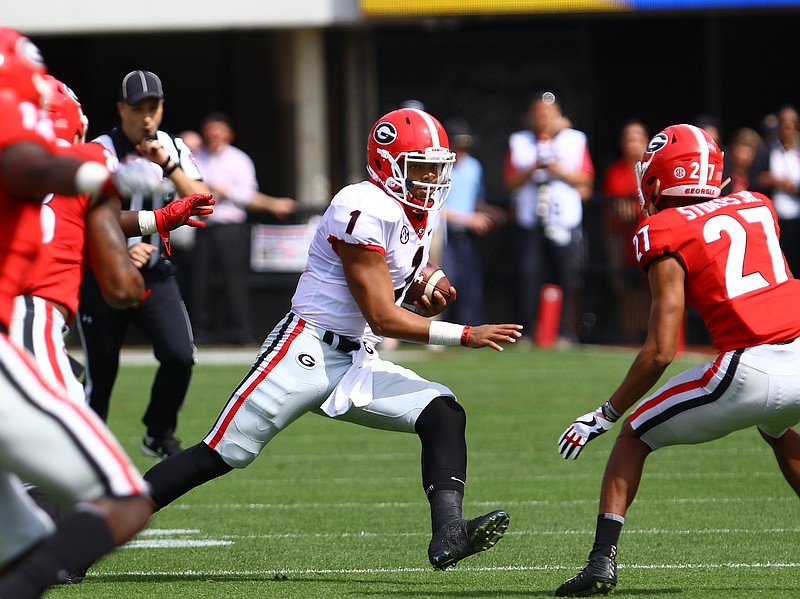 Georgia five-star freshman Justin Fields (1) enrolled in January and competed this spring with sophomore Jake Fromm, who guided the Bulldogs to last season's Southeastern Conference title. (Andy Harrison/Georgia Photo)
