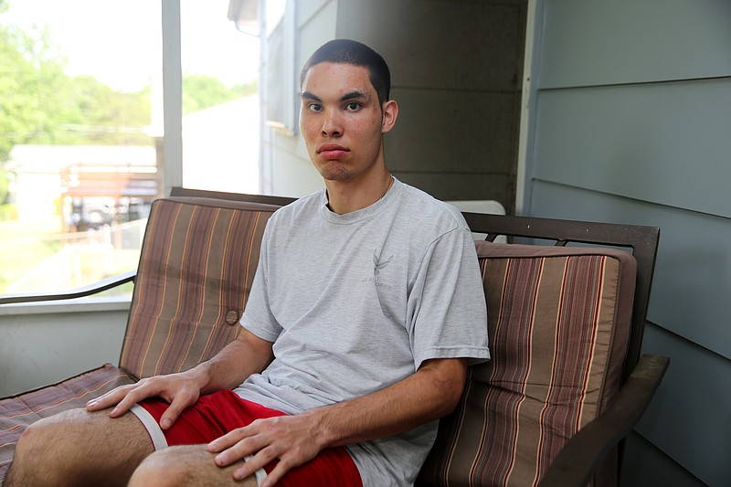 Nickolas Current, 18, poses for a photo at his Chattanooga, Tenn., home Wednesday, May 23, 2018. Current was diagnosed with autism at age 4. 